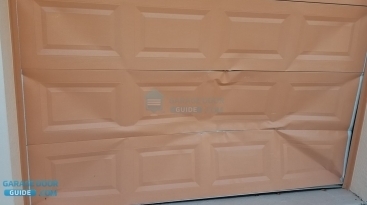 Garage Door Backed Into